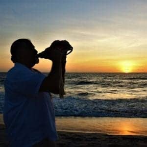 Shell horn beach wedding, officiant & photographer