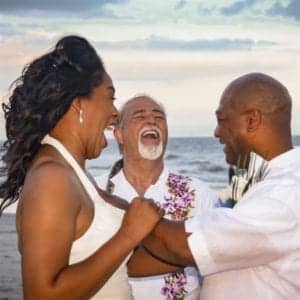 Wedding Photos officiant David laugh black couple laughing